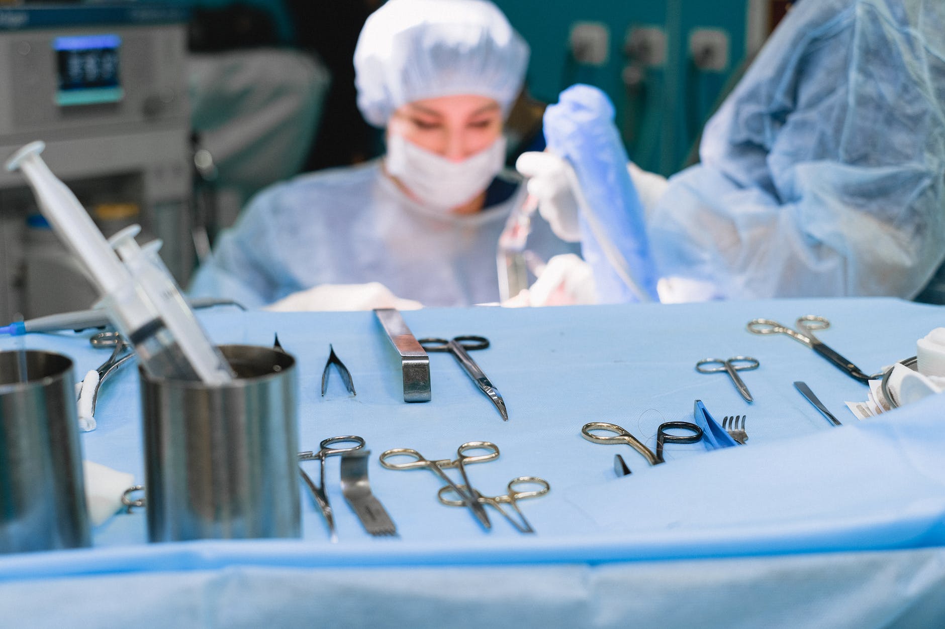 surgical equipment and surgeon performing surgery