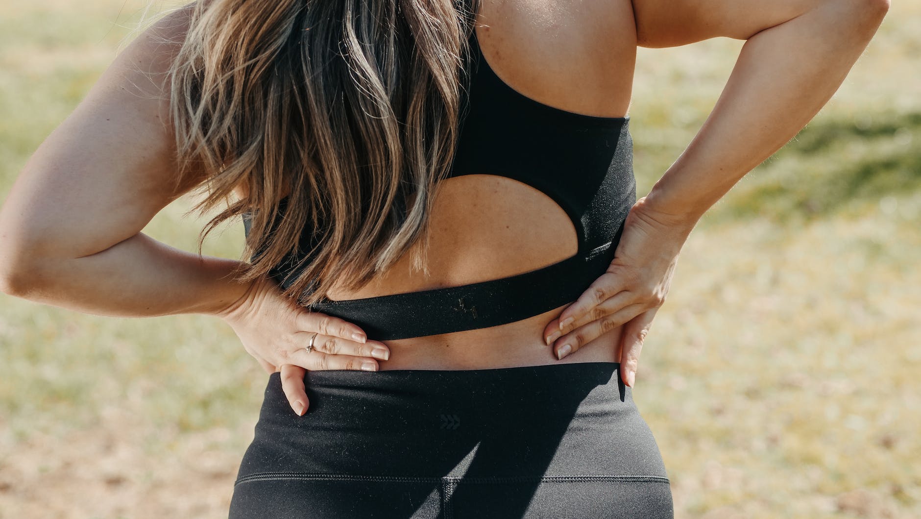 a woman having a back pain