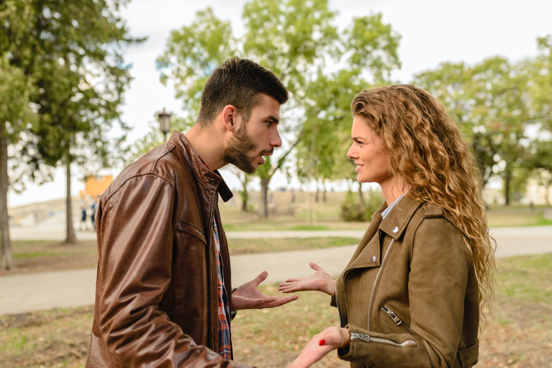 Misogyny man and woman wearing brown leather 