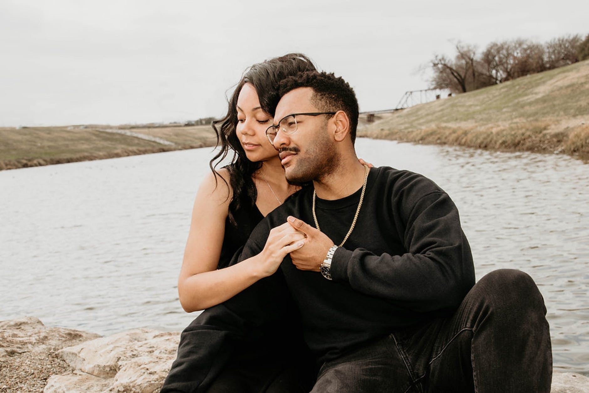 man and woman holding hands together