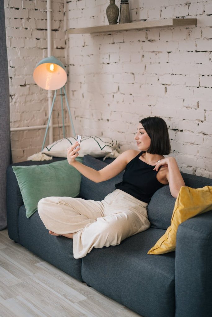 woman doing a videocall in the living room for Valentine's Day video message