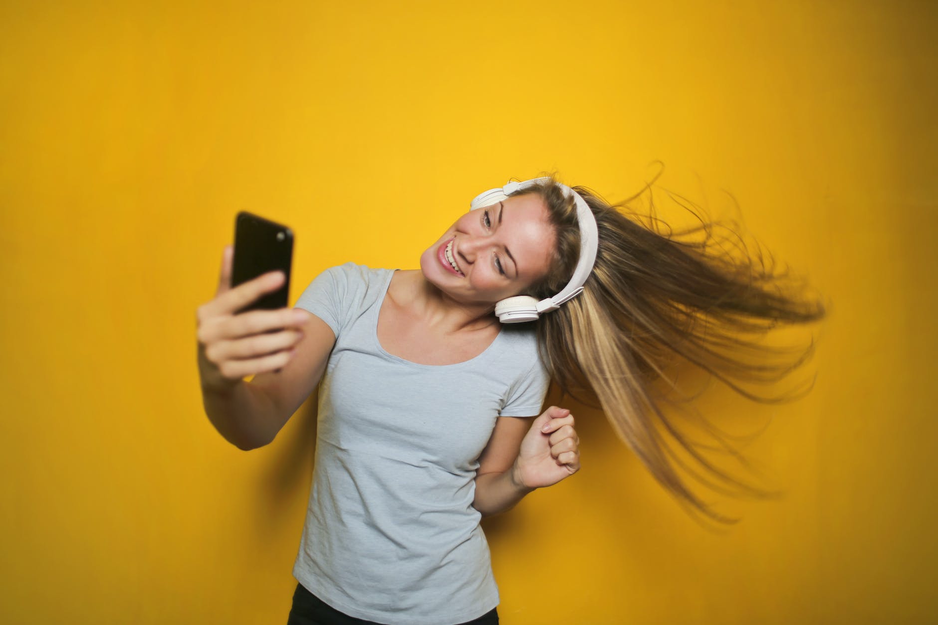 photography of a woman listening to music: Virtual Date Ideas