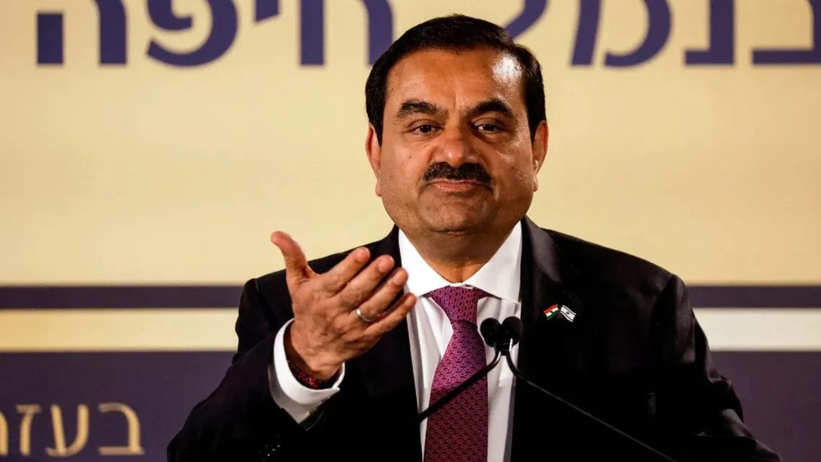 Adani to invest USD 14 billion in FY25