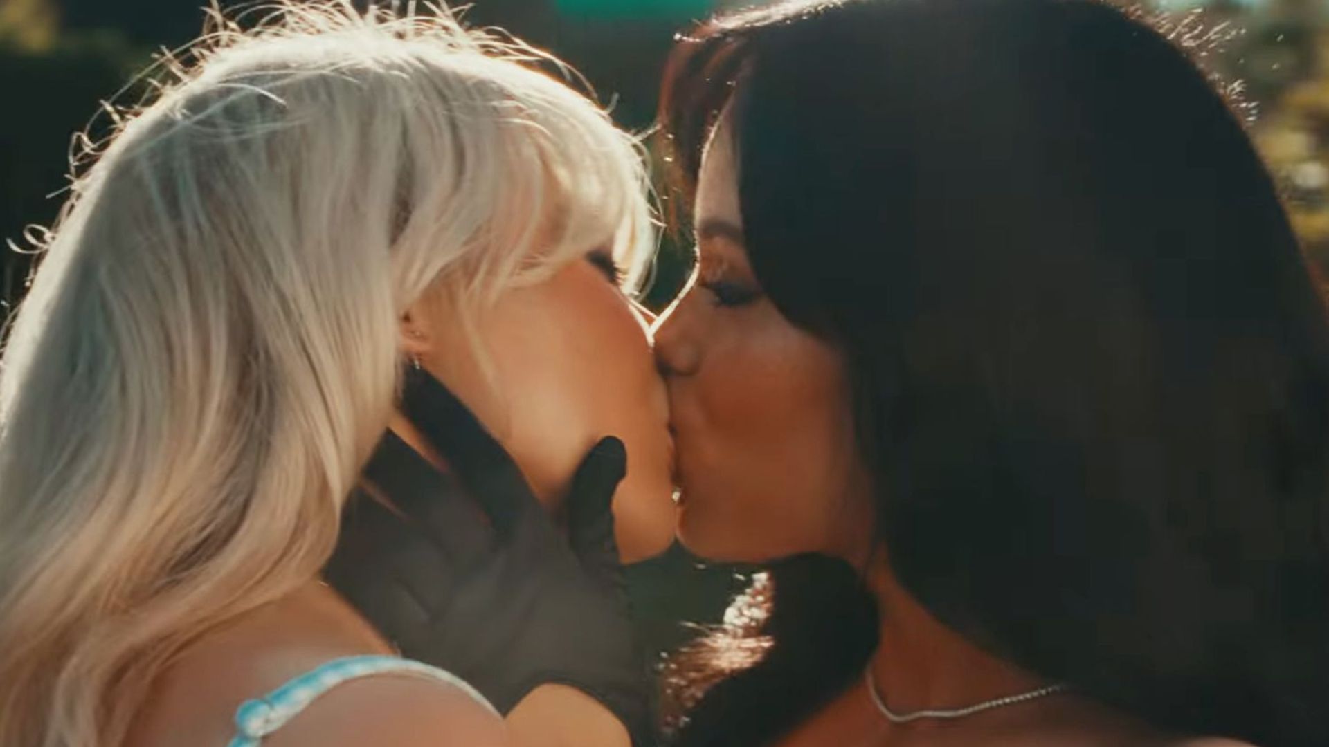 Sabrina Carpenter and Jenna Ortega Share a Kiss in Music Video “Taste”